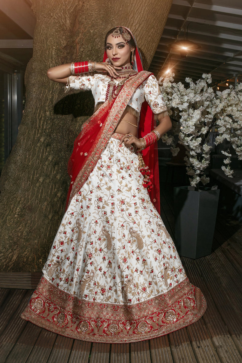 Red and white bridal on sale lehenga